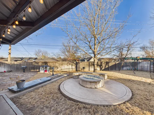 a view of a house with a snow in the yard
