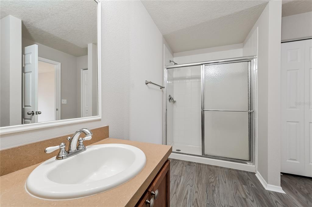 149 Springberry Court Daytona Beach, FL 32124 - Photo 9 of 16 a bathroom with a sink and a mirror