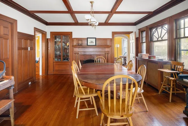 a dining room with furniture window wooden floor