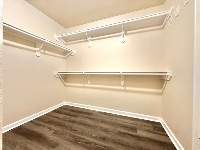 a view of a room with racks on the wall