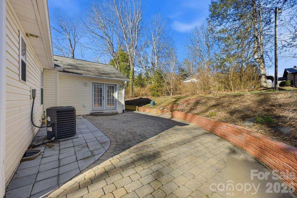 1113 Brookside Camp Road Hendersonville, NC 28792 - Photo 19 of 20 a view of a backyard with sitting area