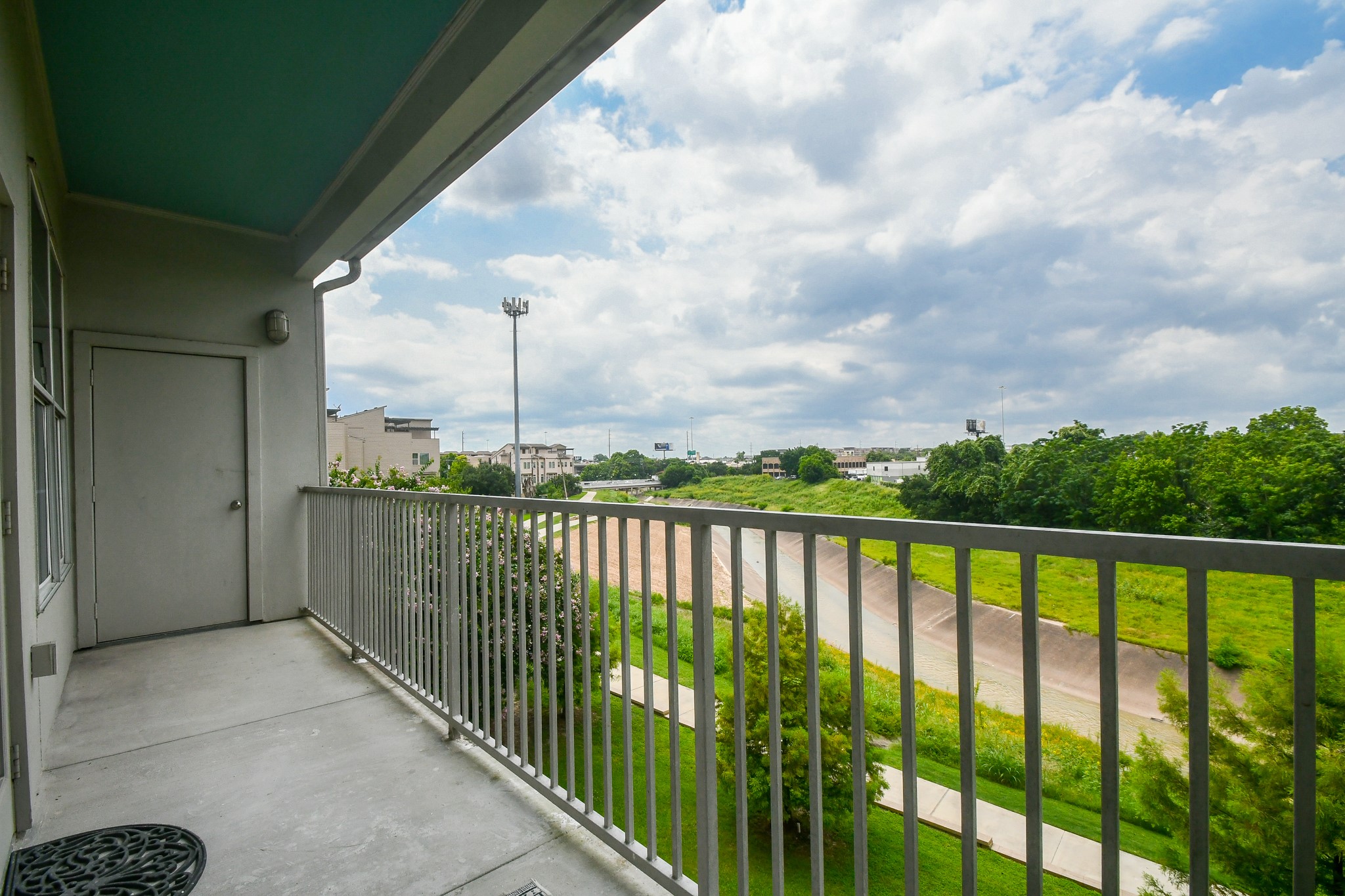 1441 East Street, Unit 302 Houston, TX 77007 - Photo 25 of 32 Private Balcony with Storage Closet