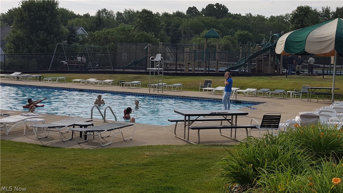 4205 Devonshire Akron, OH 44321 - Photo 33 of 35 The Kingsbury Reserve neighborhood has swim, tennis, playground and rec center along with walking trails. The fee is $400 a year for all of this!!!