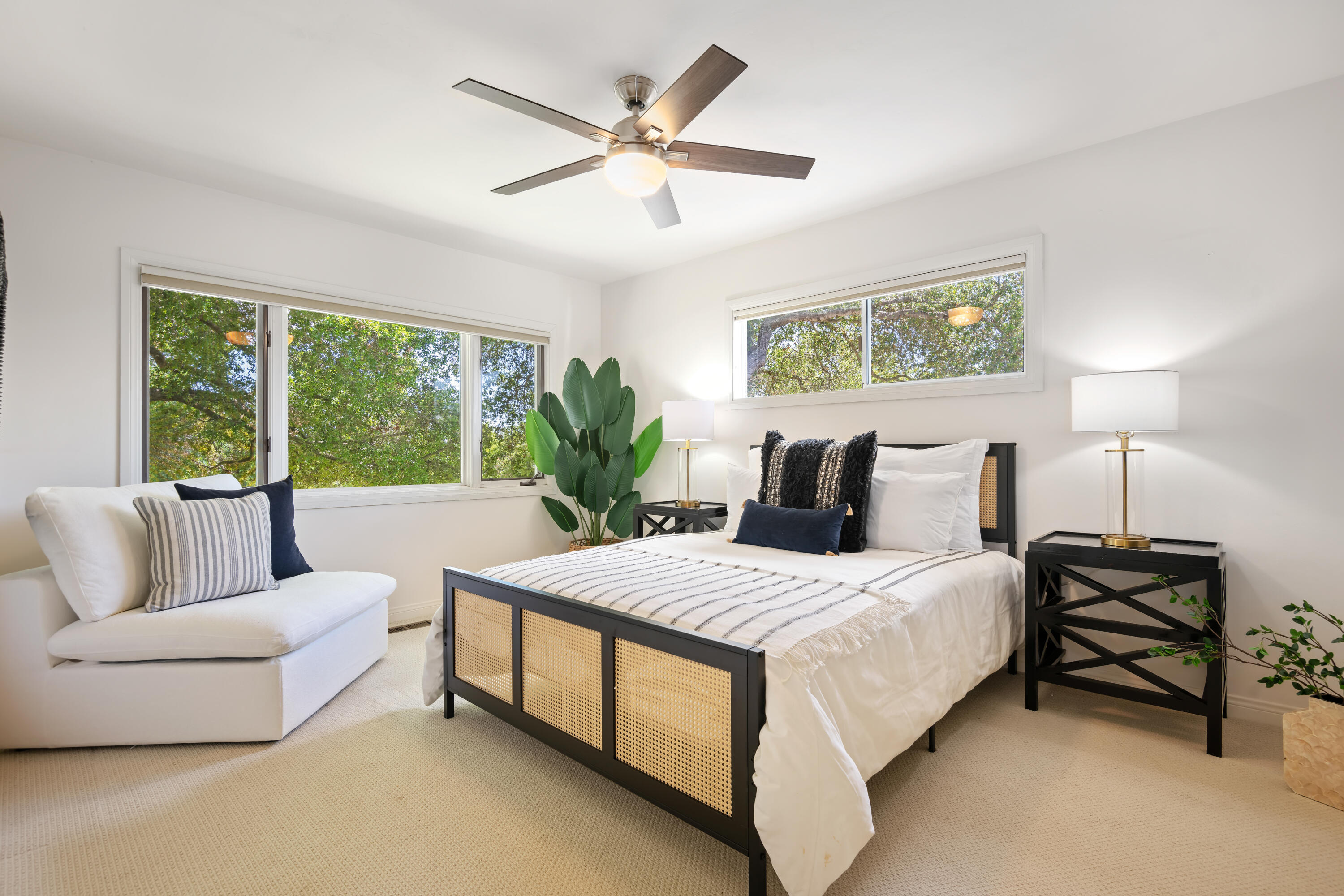 599 Mountain Drive Santa Barbara, CA 93103 - Photo 7 of 11 a spacious bedroom with a bed and a couch