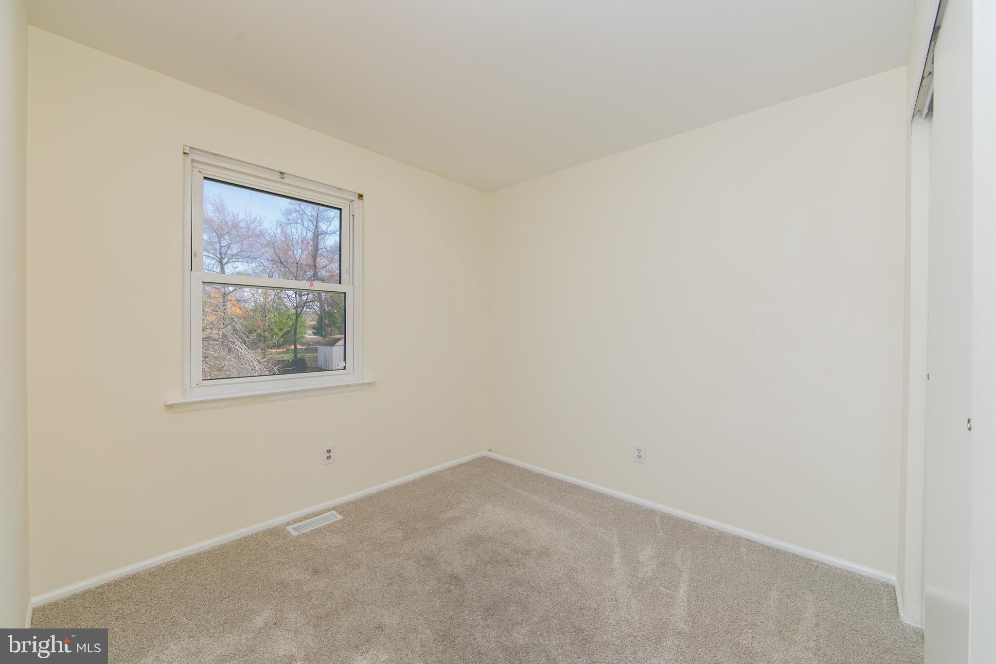 1042 Central Avenue Runnemede, NJ 08078 - Photo 20 of 36 an empty room with a window