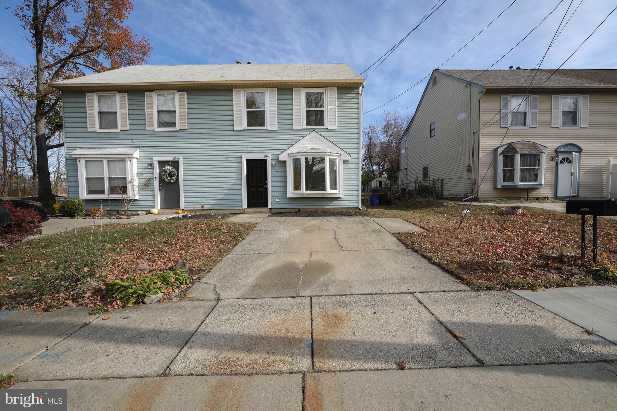 1042 Central Avenue Runnemede, NJ 08078 - Photo 2 of 36 a front view of a house with a yard