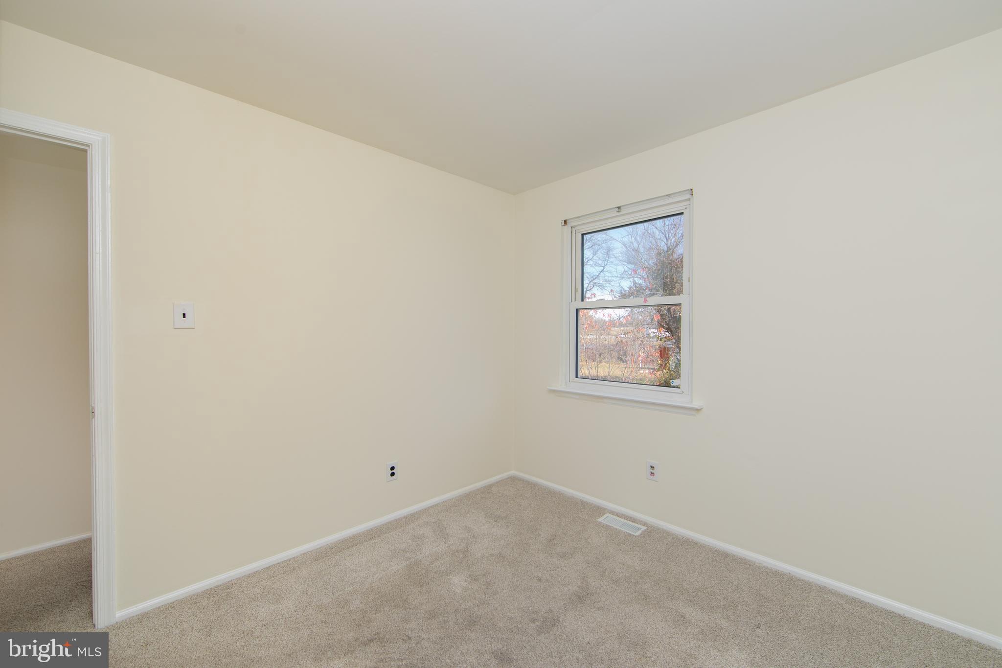 1042 Central Avenue Runnemede, NJ 08078 - Photo 22 of 36 an empty room with a window