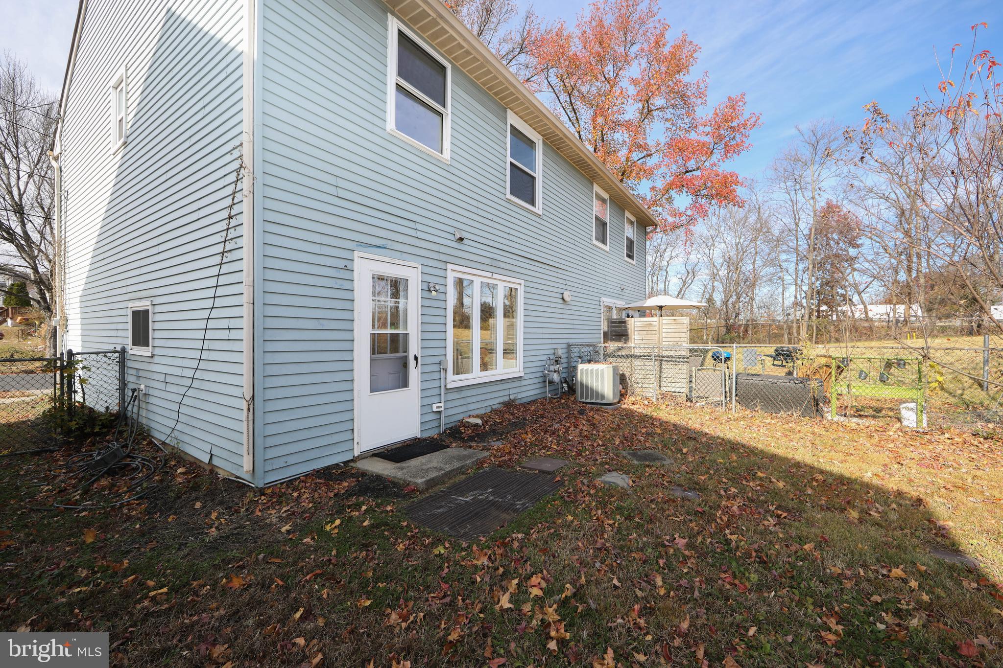 1042 Central Avenue Runnemede, NJ 08078 - Photo 29 of 36 a view of a house with backyard and trees