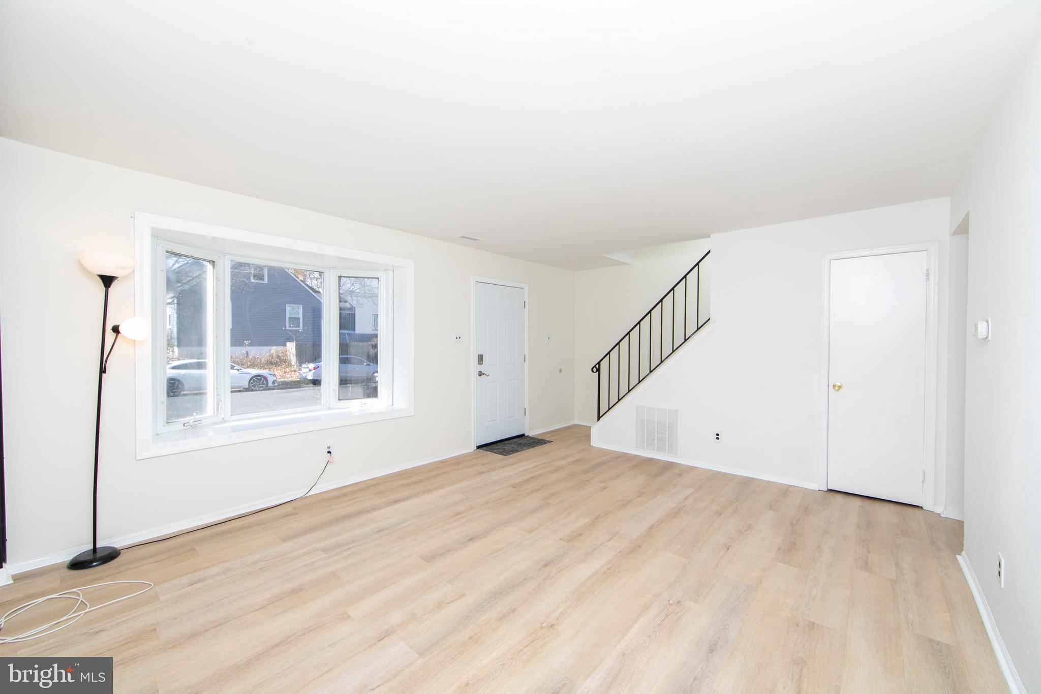 1042 Central Avenue Runnemede, NJ 08078 - Photo 6 of 36 a view of an empty room with a window