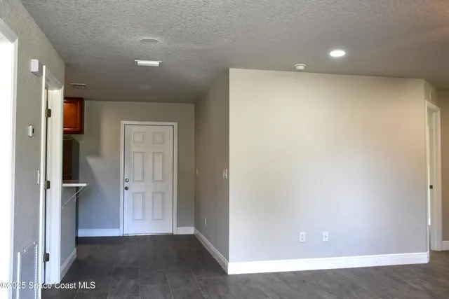 an empty room with closet