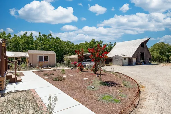 a view of a house with entertaining space