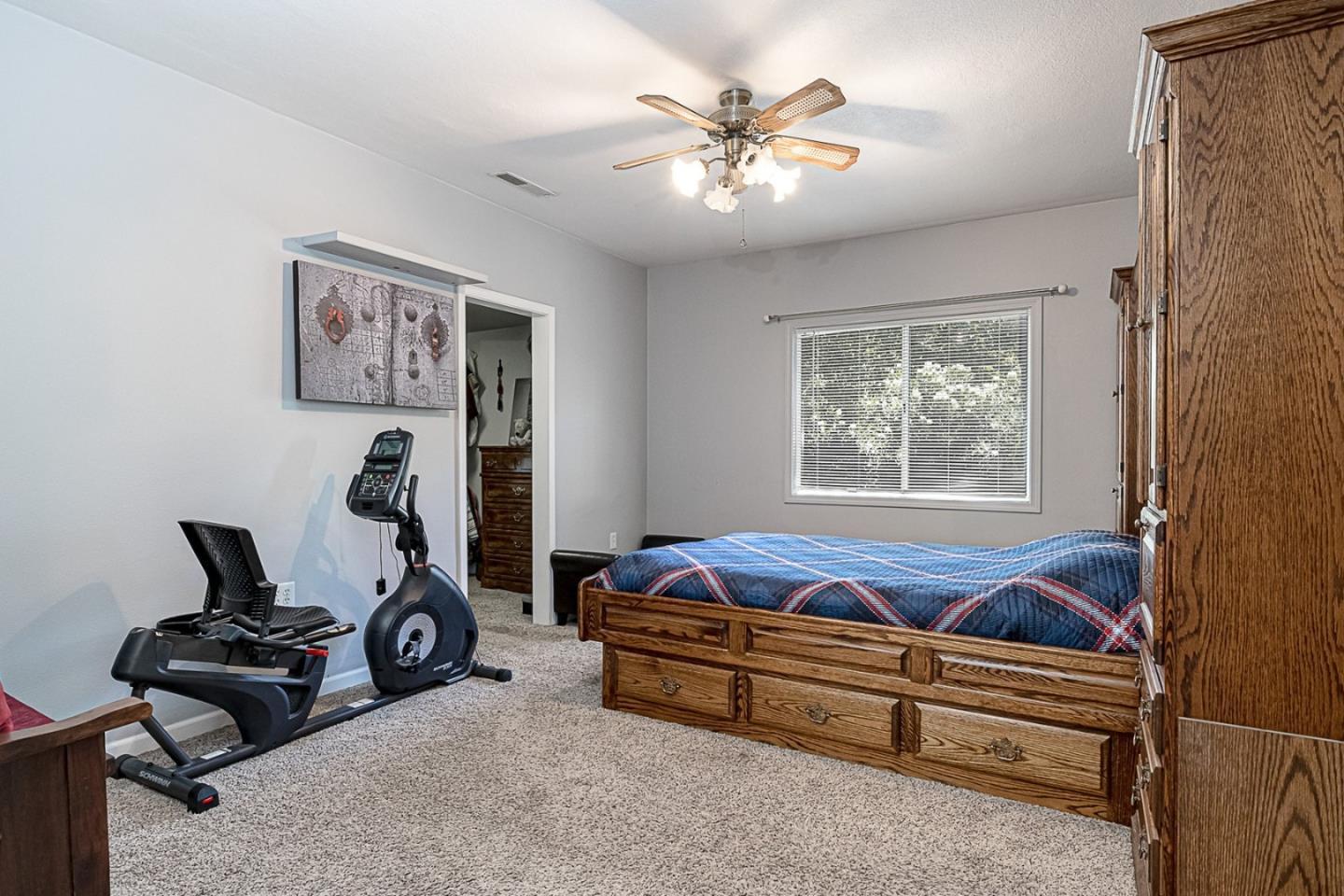 3719 North Hart Road Modesto, CA 95358 - Photo 10 of 43 a living room with furniture and a window