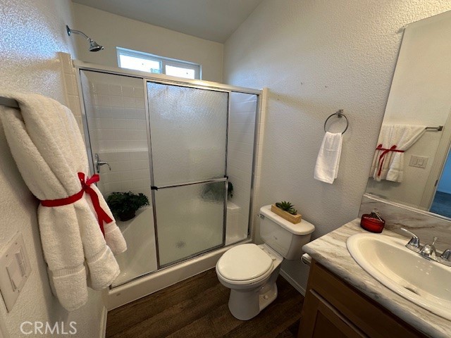 43601 East Florida Avenue, Unit 98 Hemet, CA 92544 - Photo 11 of 16 a bathroom with a sink toilet and shower