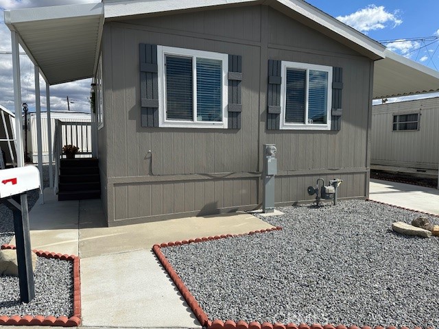 43601 East Florida Avenue, Unit 98 Hemet, CA 92544 - Photo 3 of 16 a bathroom with a granite countertop sink