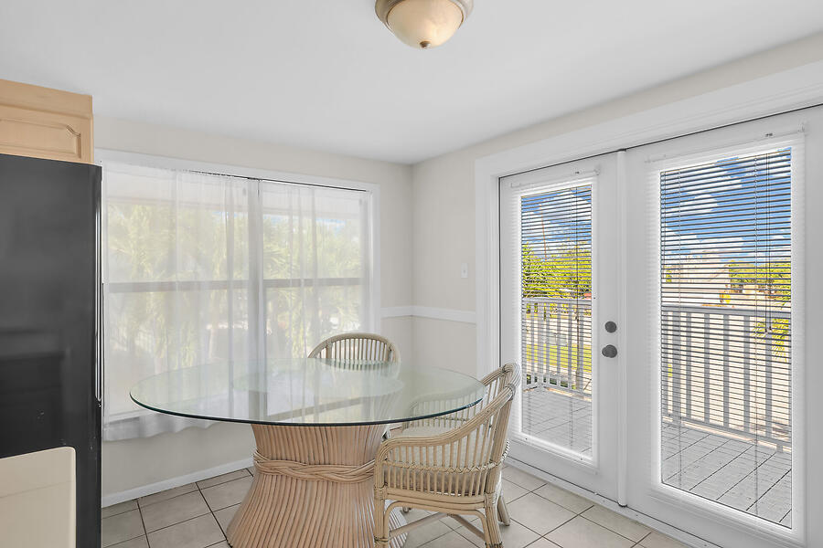 303 Sombrero Beach Road Marathon, FL 33050 - Photo 55 of 84 Side A-dining french doors & full window