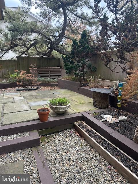 a view of a backyard with sitting area