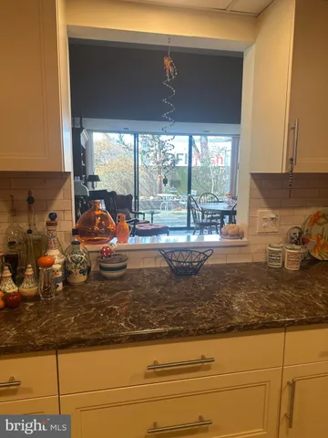 a kitchen with large window