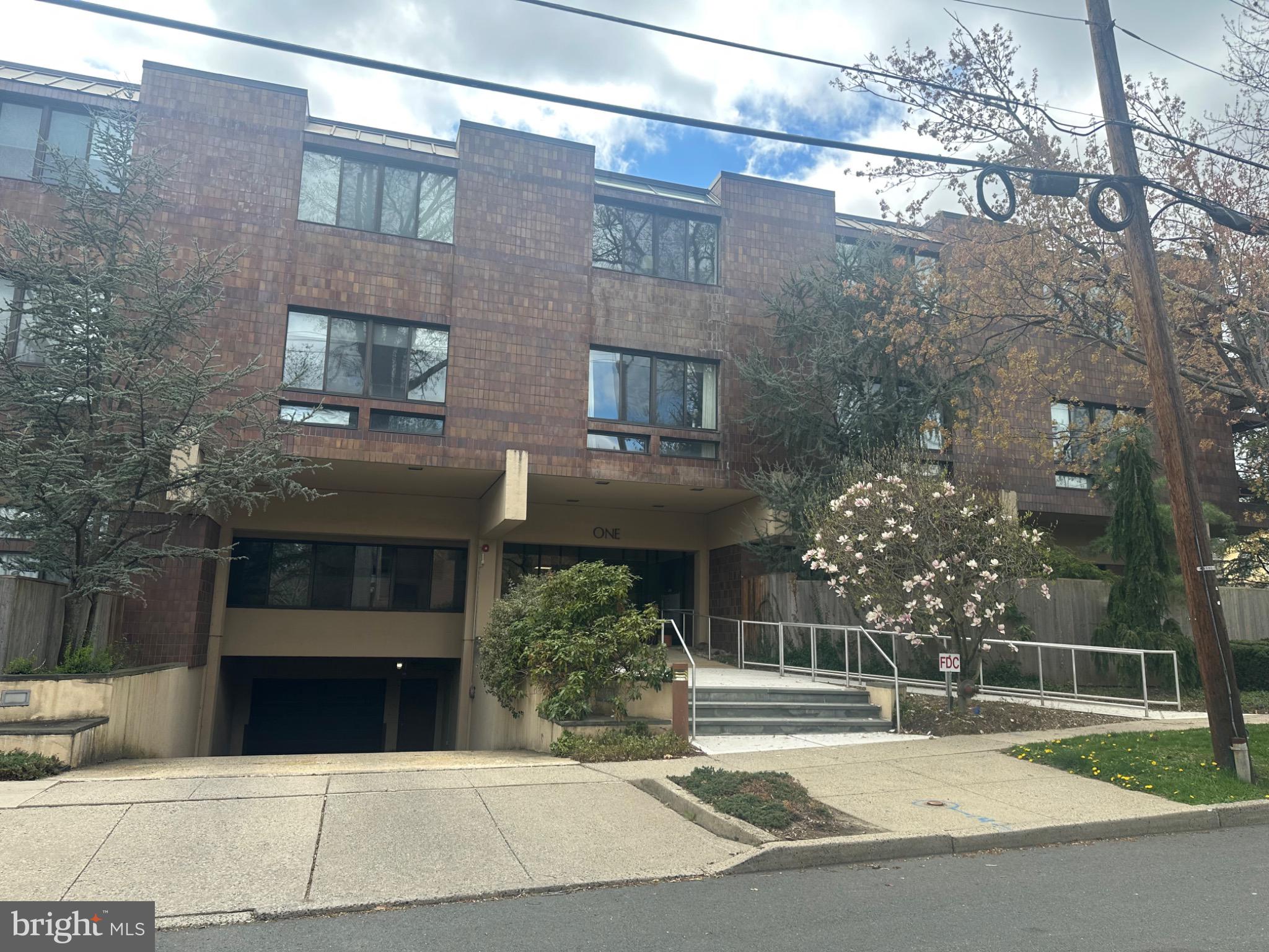 1 Markham Road, Unit 1D Princeton, NJ 08540 - Photo 27 of 49 a view of a building with a tree