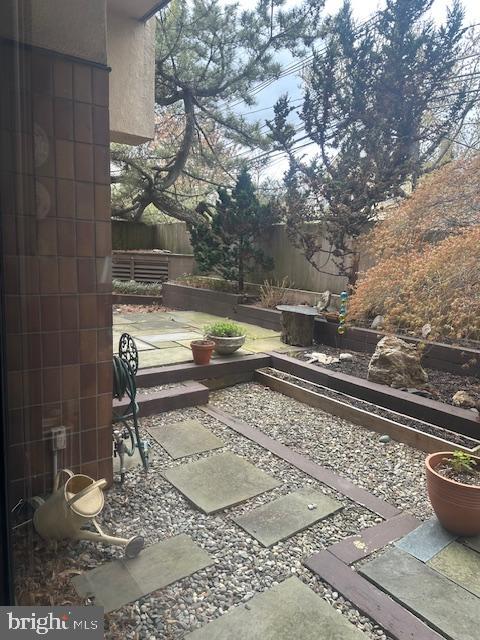 1 Markham Road, Unit 1D Princeton, NJ 08540 - Photo 26 of 55 Serene garden retreat with stone pathways.