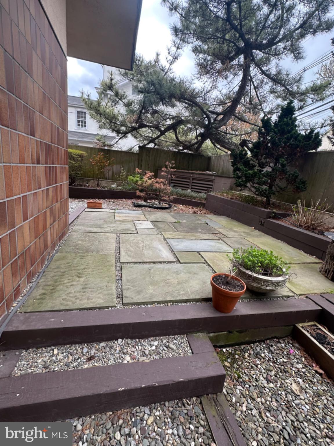1 Markham Road, Unit 1D Princeton, NJ 08540 - Photo 48 of 55 a view of a backyard with sitting area