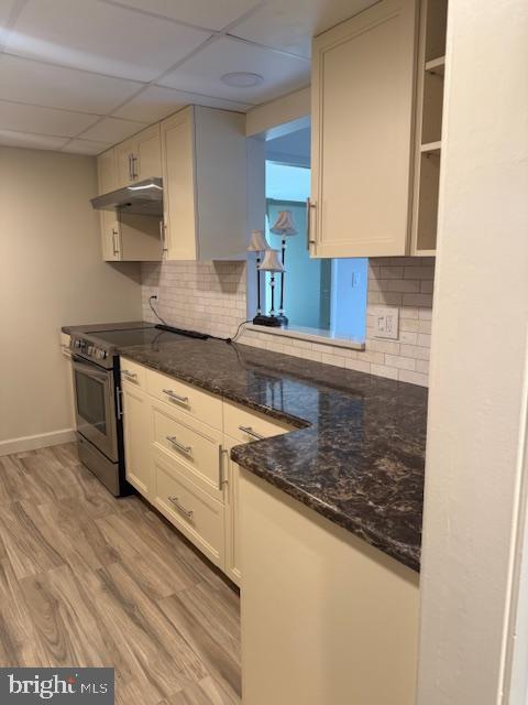 1 Markham Road, Unit 1D Princeton, NJ 08540 - Photo 6 of 55 a kitchen with stainless steel appliances granite countertop a sink stove and cabinets
