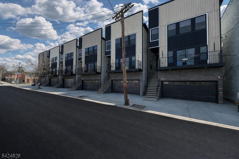 262 Hunterdon Street, Unit 1 Newark, NJ 07103 - Photo 1 of 31 a view of a building with a street