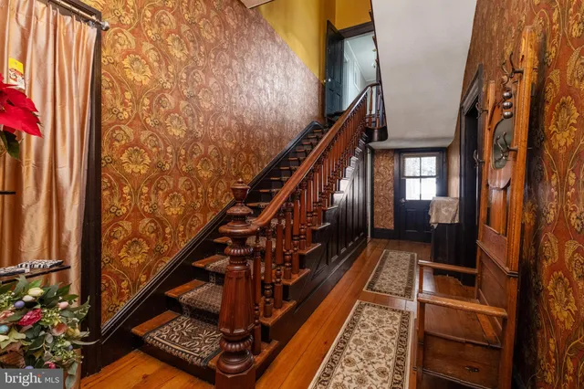 a outdoor space with lots of furniture and a chandelier