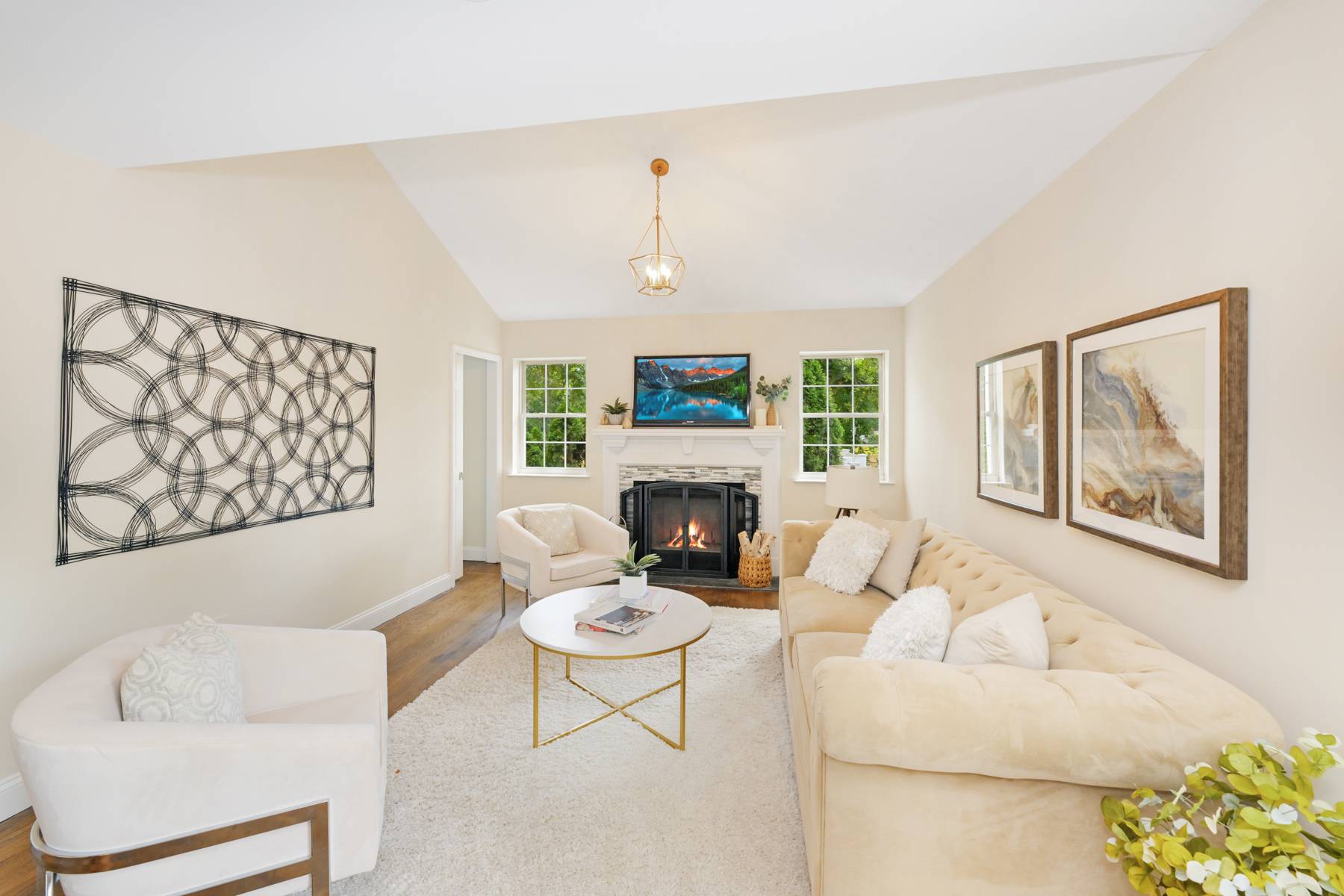 19 Summit Boulevard Westhampton, NY 11977 - Photo 13 of 38 a living room with furniture a window and a fireplace