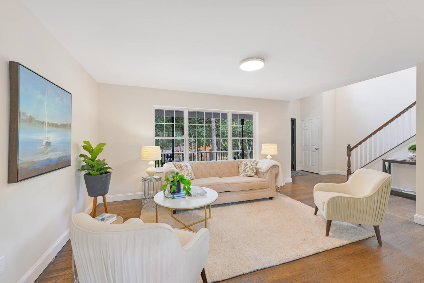 19 Summit Boulevard Westhampton, NY 11977 - Photo 27 of 38 a living room with furniture and a potted plant