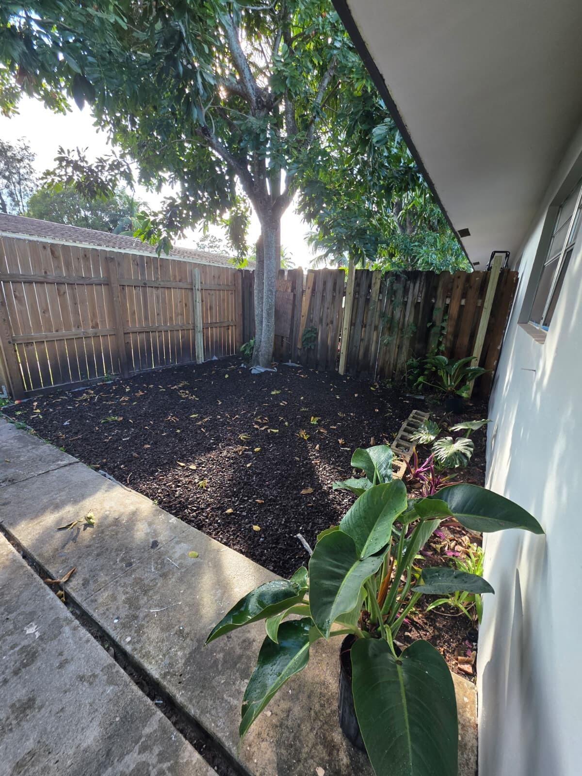 3386 Rudolph Road Lake Worth Beach, FL 33461 - Photo 5 of 25 a view of a backyard