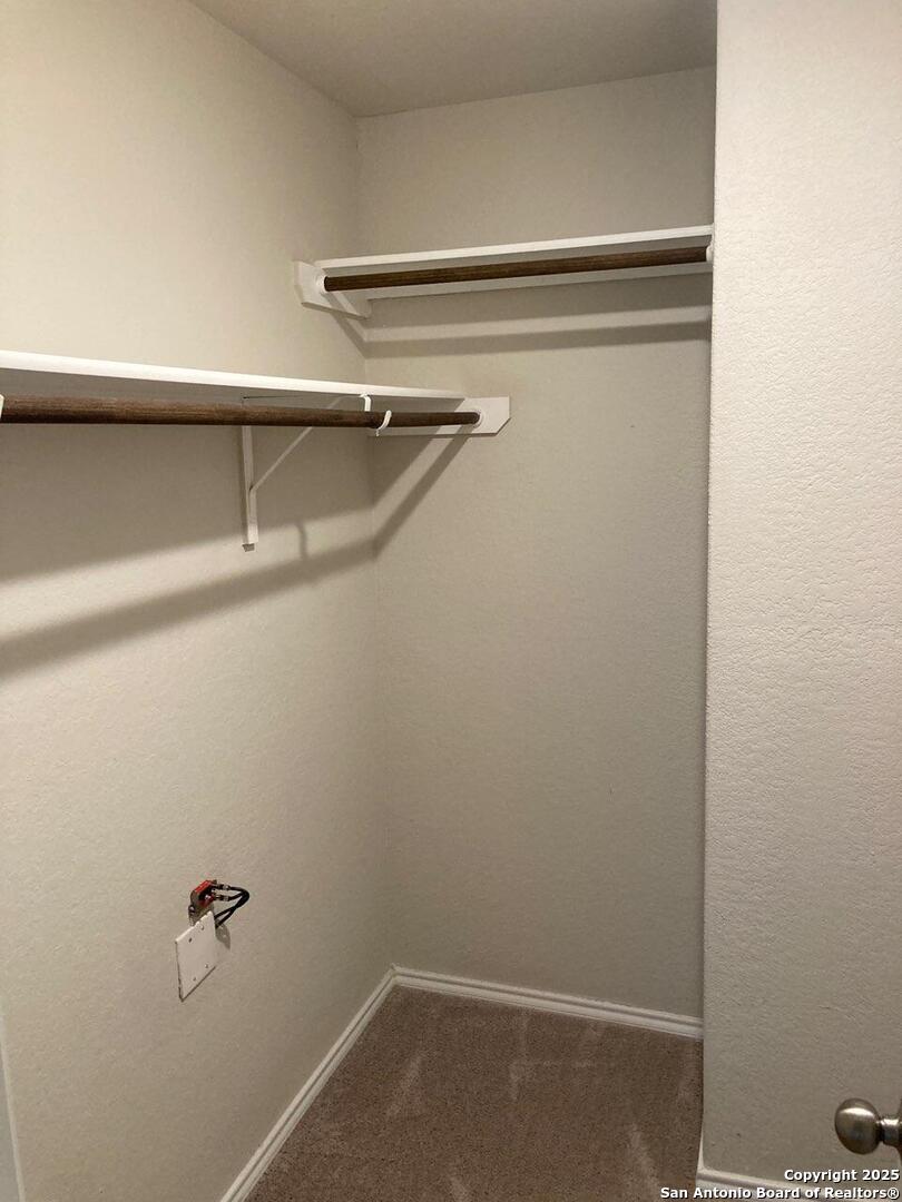 3815 Key W Way, Unit 1 Converse, TX 78109 - Photo 5 of 11 a close up view of racks on the wall