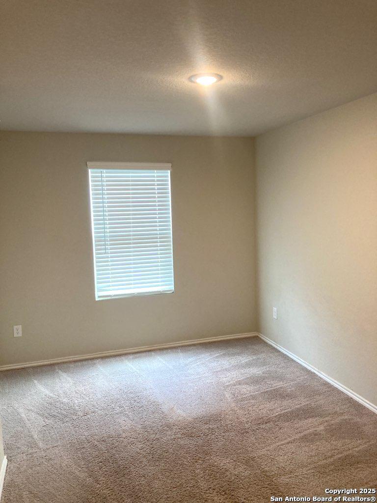 3815 Key W Way, Unit 1 Converse, TX 78109 - Photo 7 of 11 an empty room with a window