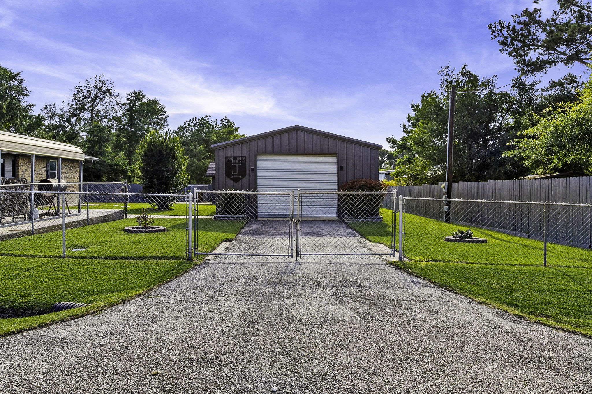 188 Huckleberry Road Onalaska, TX 77360 - Photo 38 of 49 a house view with a play ground in front of it