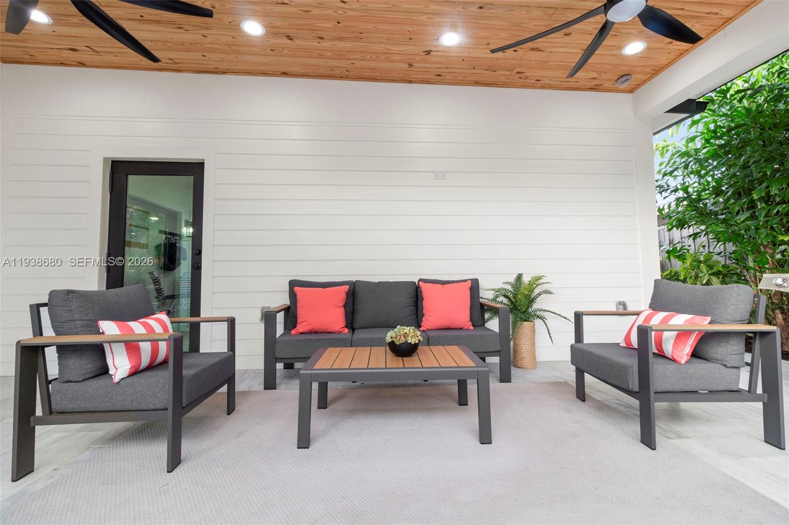 3540 Northeast 28th Avenue Lighthouse Point, FL 33064 - Photo 17 of 47 a outdoor living space with furniture and a couch