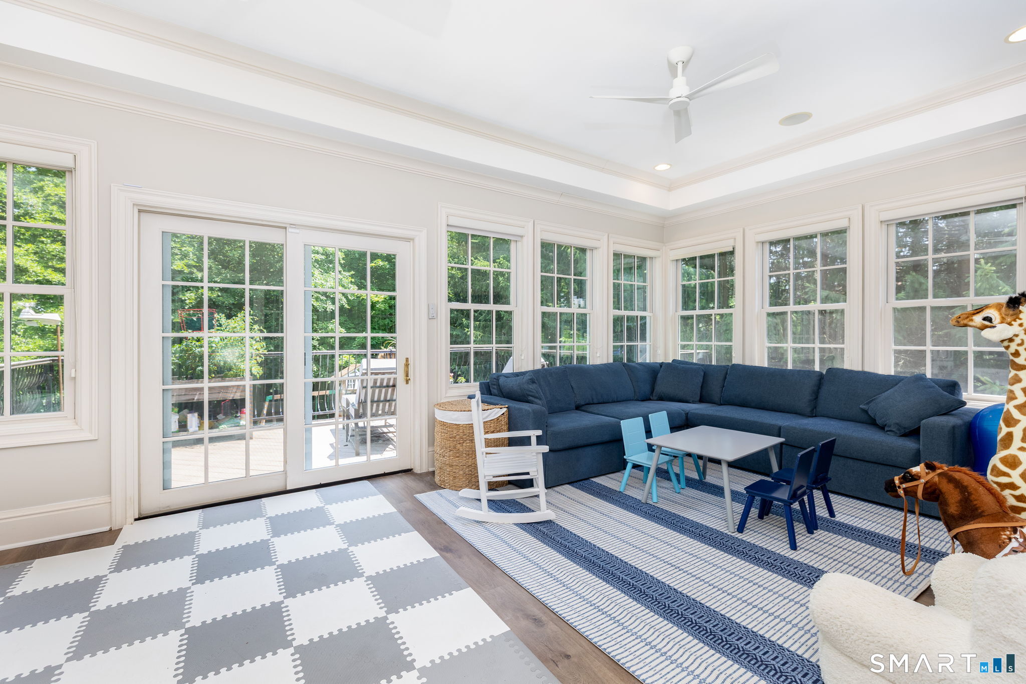 82 Ledyard Road West Hartford, CT 06117 - Photo 20 of 40 The sunroom has direct access to the deck and yard