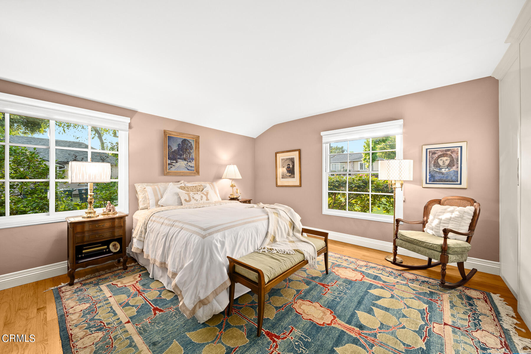 3780 Fairmeade Road Pasadena, CA 91107 - Photo 21 of 73 a bedroom with a bed a chair and next to a window