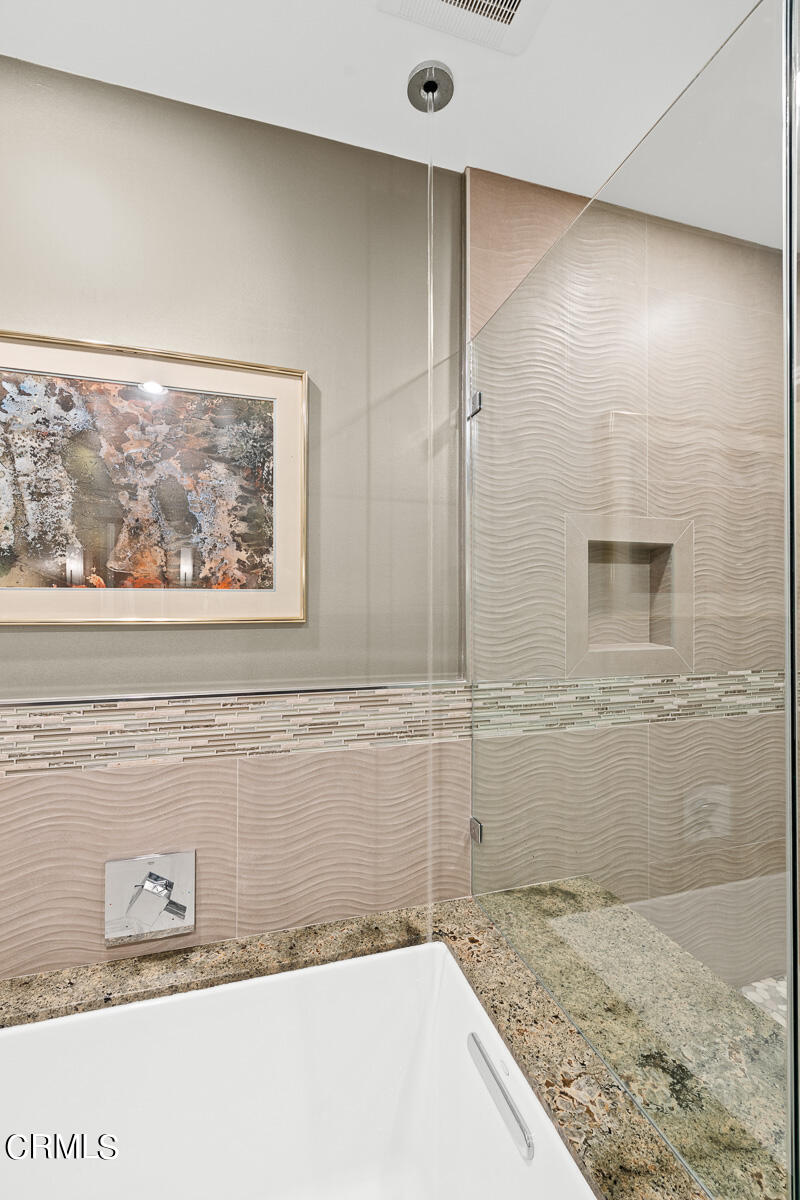 3780 Fairmeade Road Pasadena, CA 91107 - Photo 25 of 73 a bathroom with a granite countertop sink and a shower