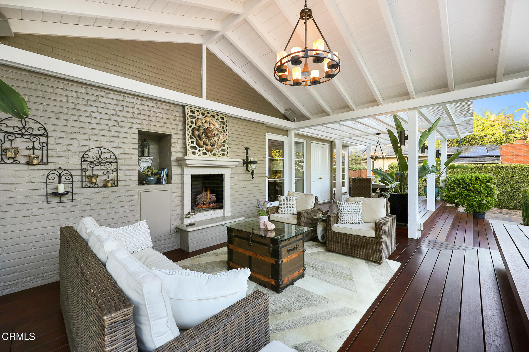 3780 Fairmeade Road Pasadena, CA 91107 - Photo 36 of 73 a living room with furniture a fireplace and wooden floor