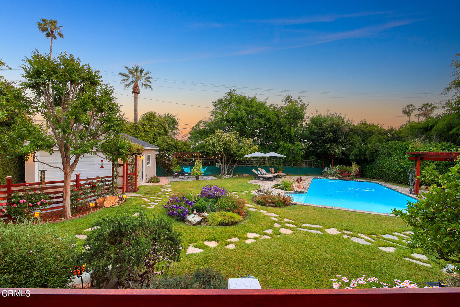 3780 Fairmeade Road Pasadena, CA 91107 - Photo 38 of 73 a view of a swimming pool with an outdoor space and seating area