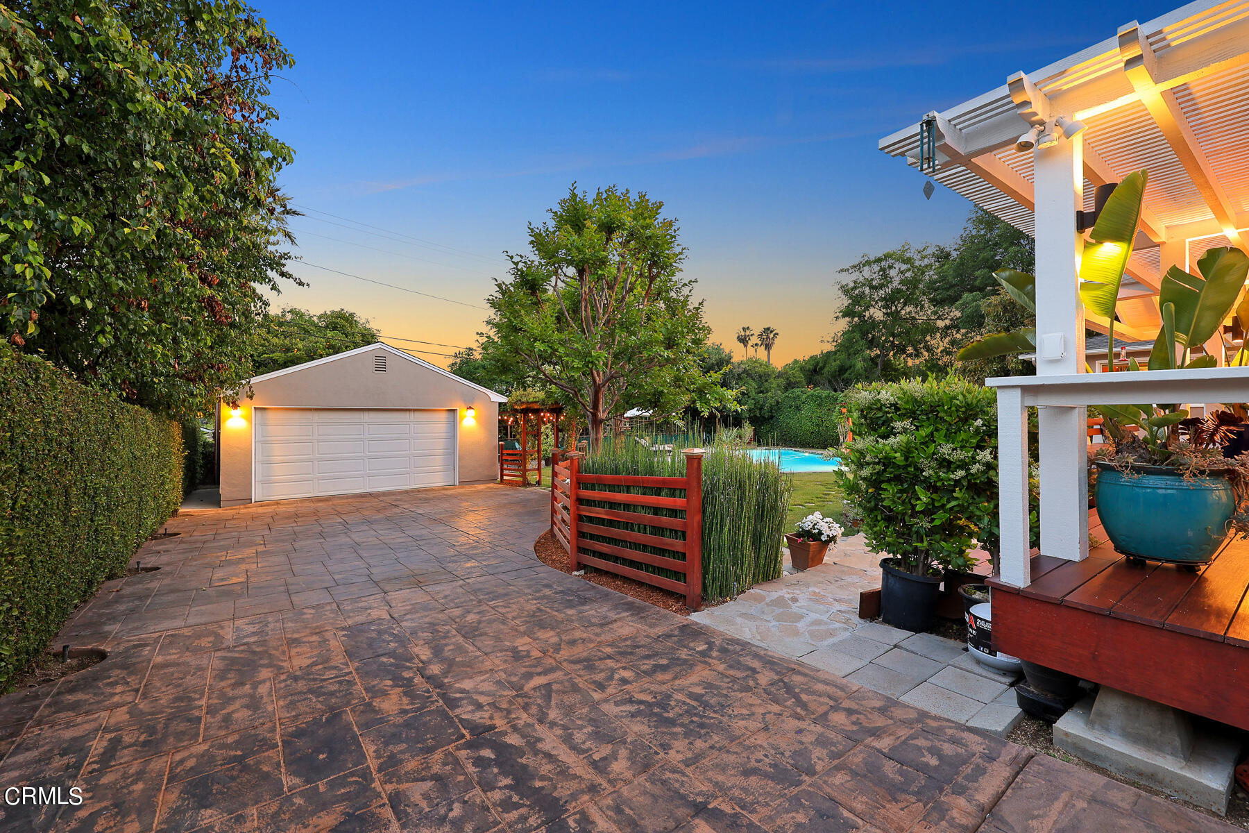 3780 Fairmeade Road Pasadena, CA 91107 - Photo 39 of 73 a view of a chairs and table in the backyard