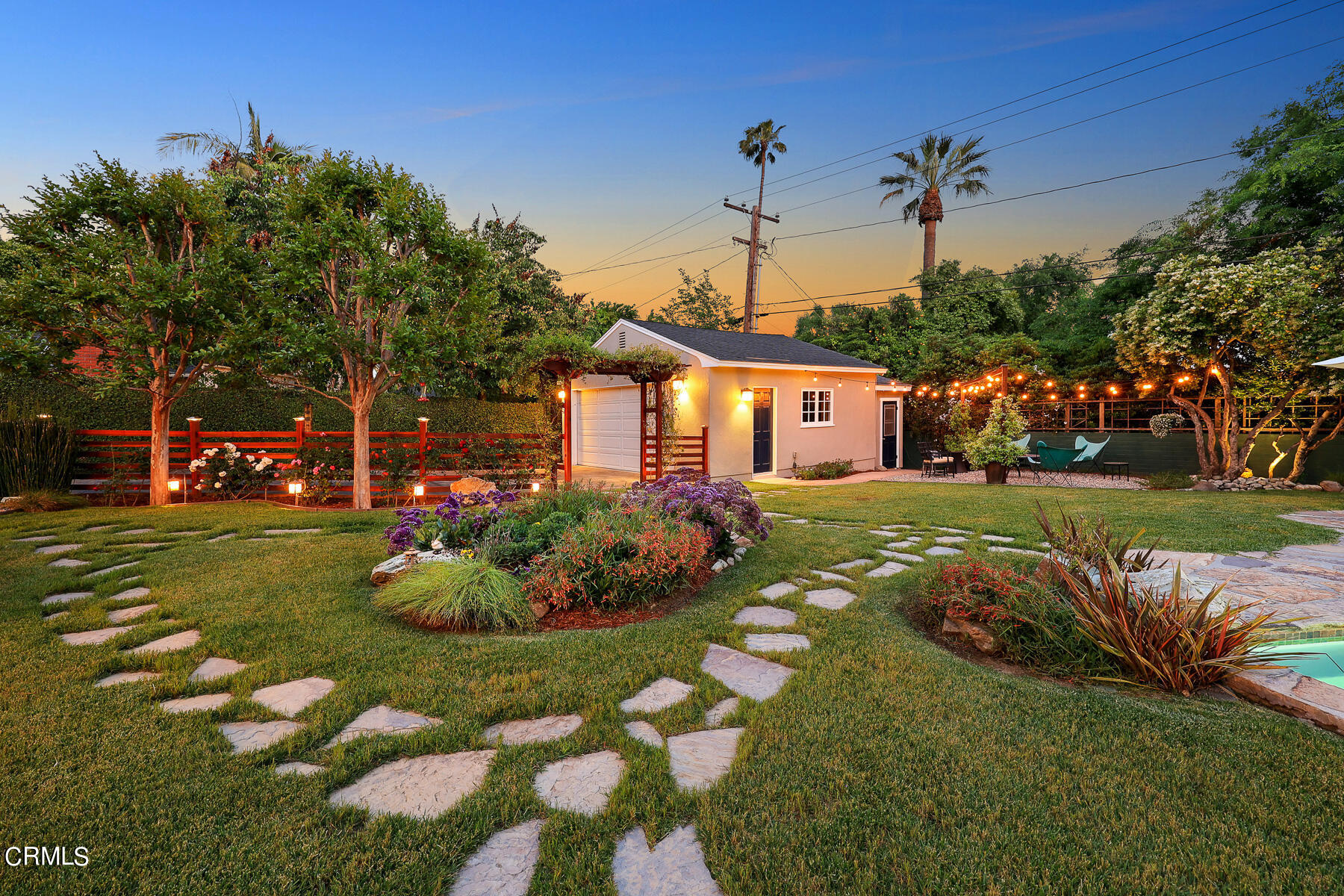 3780 Fairmeade Road Pasadena, CA 91107 - Photo 49 of 73 a front view of a house with a big yard and potted plants