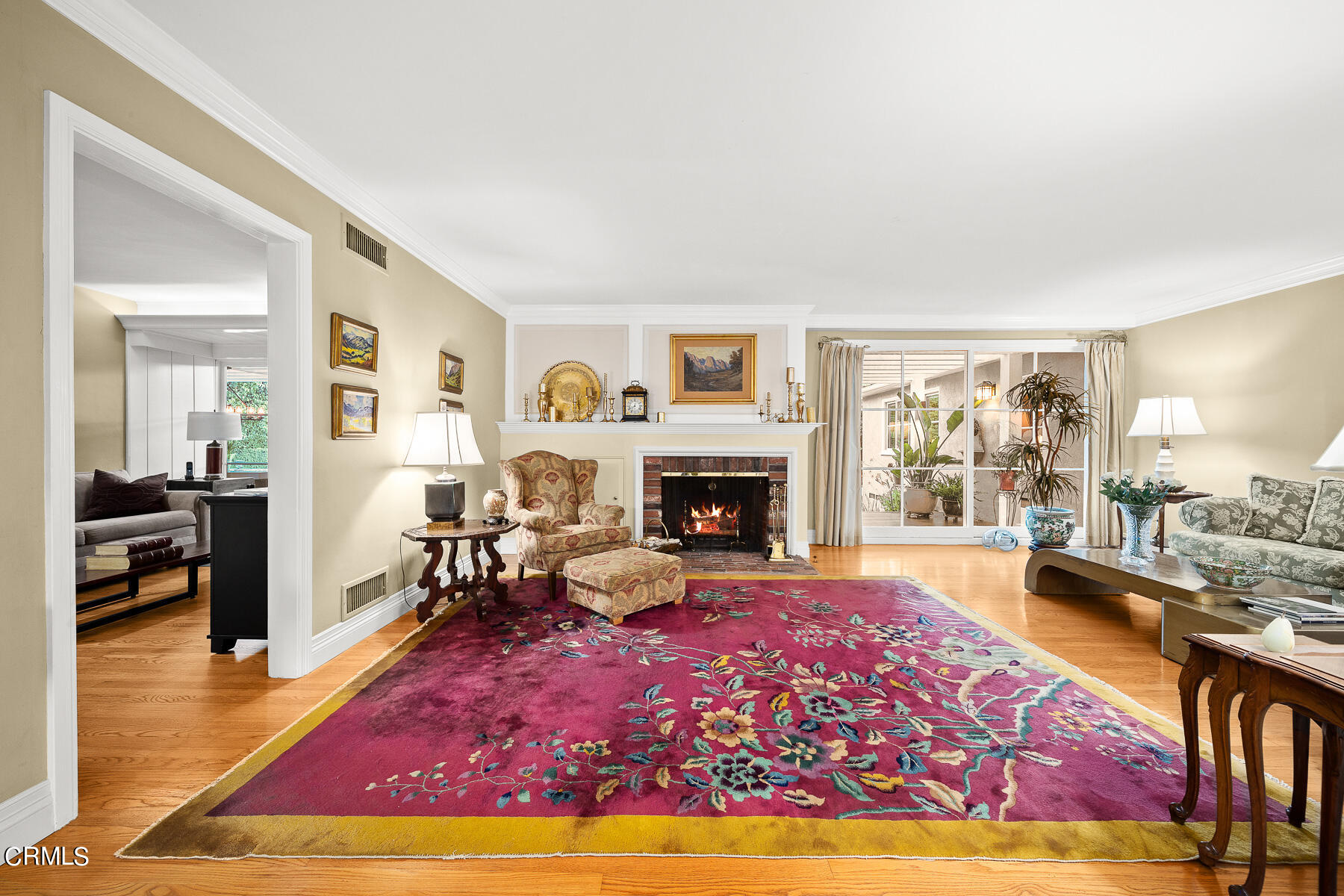 3780 Fairmeade Road Pasadena, CA 91107 - Photo 6 of 73 a living room with furniture rug and a fireplace