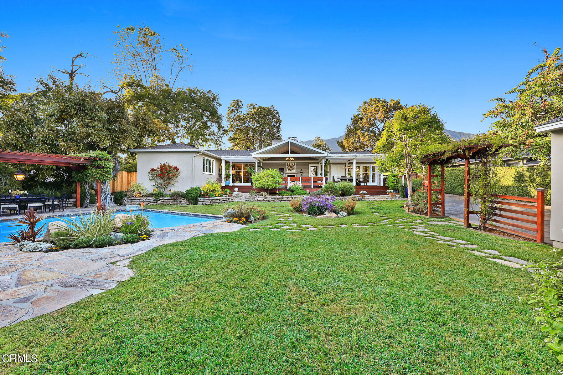 3780 Fairmeade Road Pasadena, CA 91107 - Photo 62 of 73 a front view of a house with a yard table and chairs