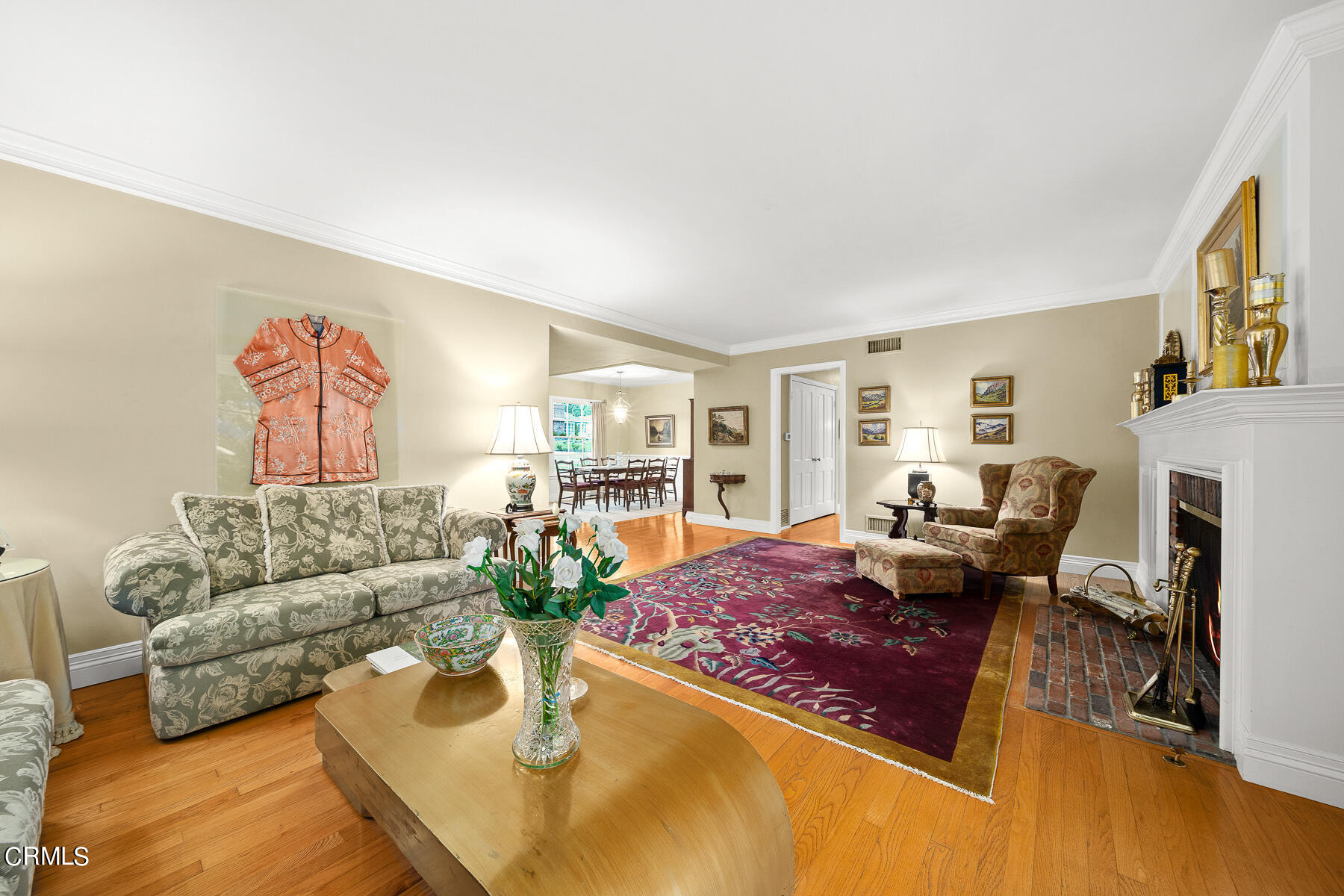 3780 Fairmeade Road Pasadena, CA 91107 - Photo 8 of 73 a living room with furniture fireplace and a table