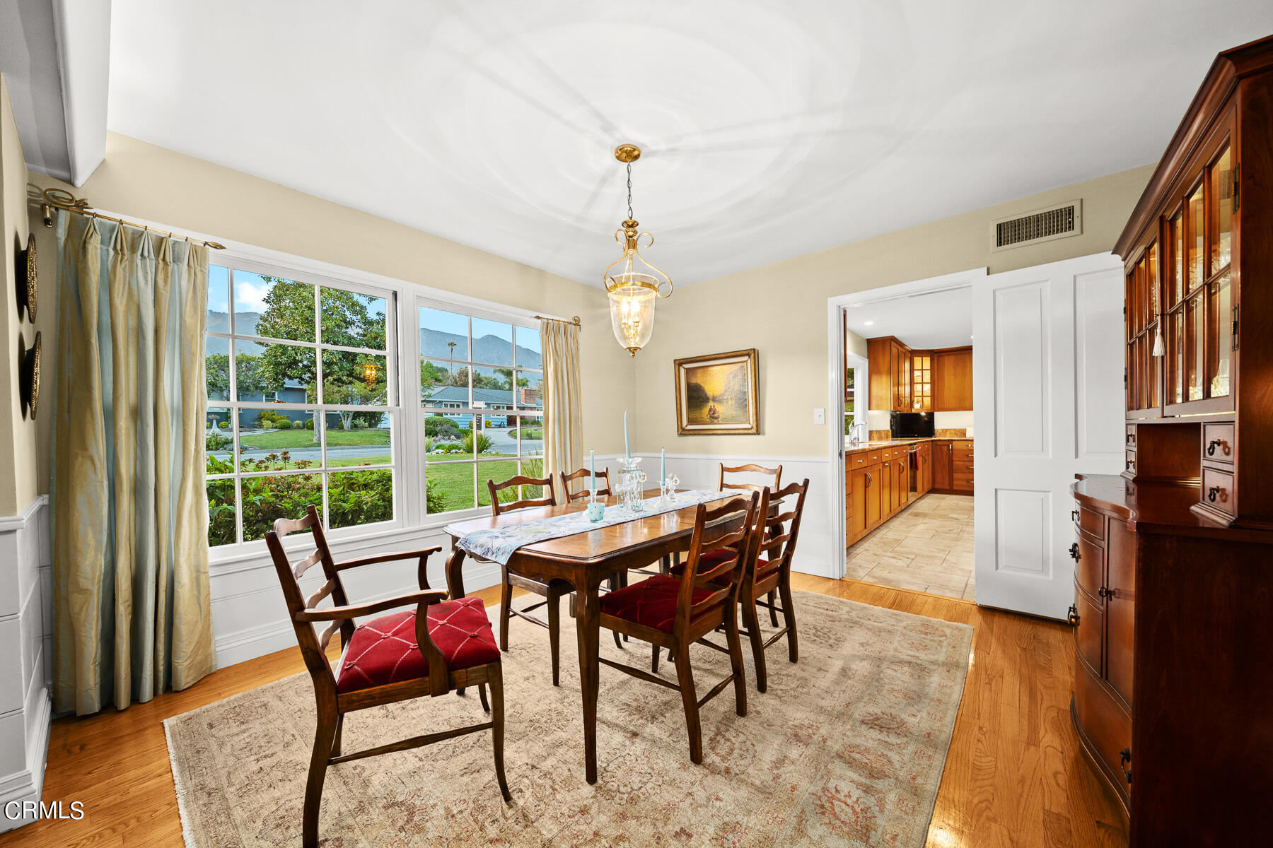 3780 Fairmeade Road Pasadena, CA 91107 - Photo 10 of 73 a view of a dining room with furniture window and wooden floor