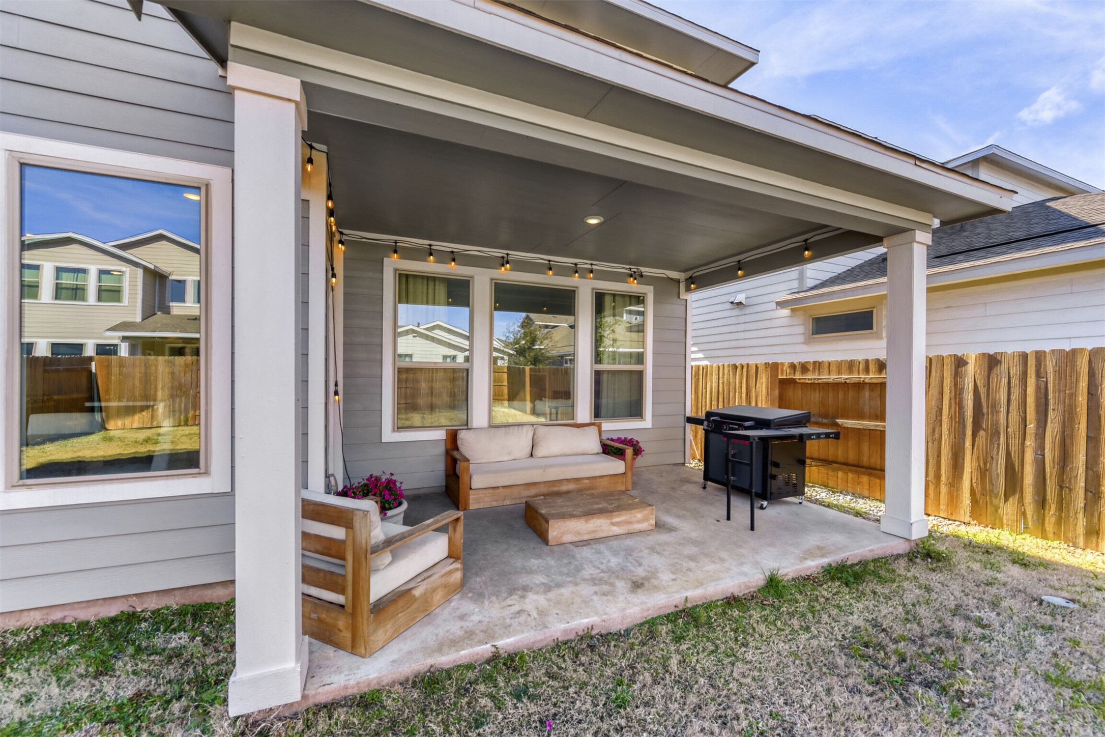 8602 Cottage Rose Drive Austin, TX 78744 - Photo 3 of 17 View of patio featuring outdoor lounge area