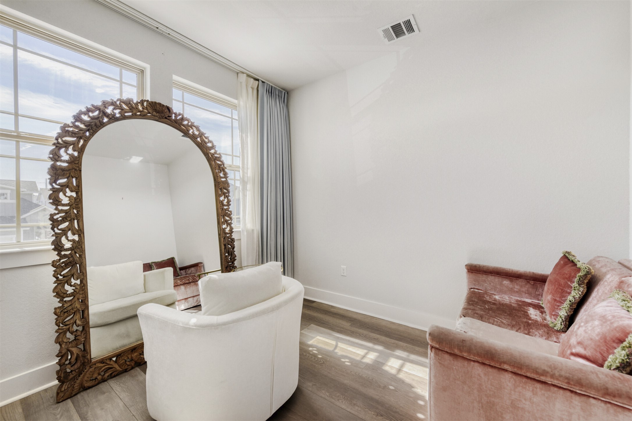 8602 Cottage Rose Drive Austin, TX 78744 - Photo 10 of 17 Sitting room with wood finished floors