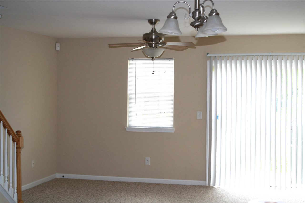 8007 River Water Court Raleigh, NC 27616 - Photo 4 of 10 a decorative lighting & window in a room