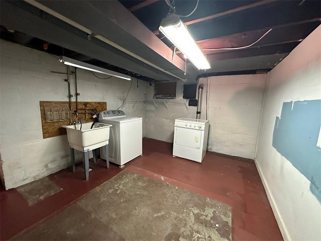 89 Thomas Street Crafton, PA 15205 - Photo 11 of 13 a utility room with dryer and washer