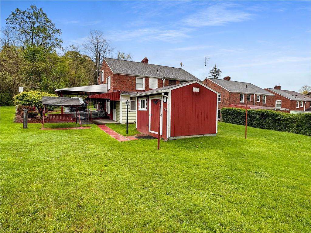 89 Thomas Street Crafton, PA 15205 - Photo 13 of 13 a front view of a house with garden